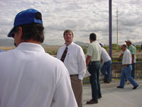 Photo of an on-site Pre-Bid Meeting was conducted on October 10, 2009 and attended by Pima County Regional Flood Control District and Procurement Staff and representatives from multiple contractors