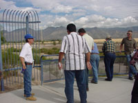 Photo of an on-site Pre-Bid Meeting was conducted on October 10, 2009 and attended by Pima County Regional Flood Control District and Procurement Staff and representatives from multiple contractors