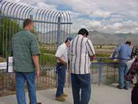 Photo of an on-site Pre-Bid Meeting was conducted on October 10, 2009 and attended by Pima County Regional Flood Control District and Procurement Staff and representatives from multiple contractors