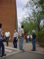 Photo of an on-site Pre-Bid Meeting was conducted on October 10, 2009 and attended by Pima County Regional Flood Control District and Procurement Staff and representatives from multiple contractors