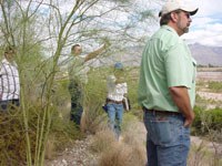 Photo of an on-site Pre-Bid Meeting was conducted on October 10, 2009 and attended by Pima County Regional Flood Control District and Procurement Staff and representatives from multiple contractors