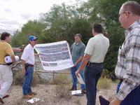 Photo of an on-site Pre-Bid Meeting was conducted on October 10, 2009 and attended by Pima County Regional Flood Control District and Procurement Staff and representatives from multiple contractors