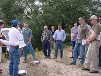 Photo of an on-site Pre-Bid Meeting was conducted on October 10, 2009 and attended by Pima County Regional Flood Control District and Procurement Staff and representatives from multiple contractors