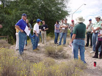 Photo of an on-site Pre-Bid Meeting was conducted on October 10, 2009 and attended by Pima County Regional Flood Control District and Procurement Staff and representatives from multiple contractors