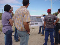 Photo of an on-site Pre-Bid Meeting was conducted on October 10, 2009 and attended by Pima County Regional Flood Control District and Procurement Staff and representatives from multiple contractors